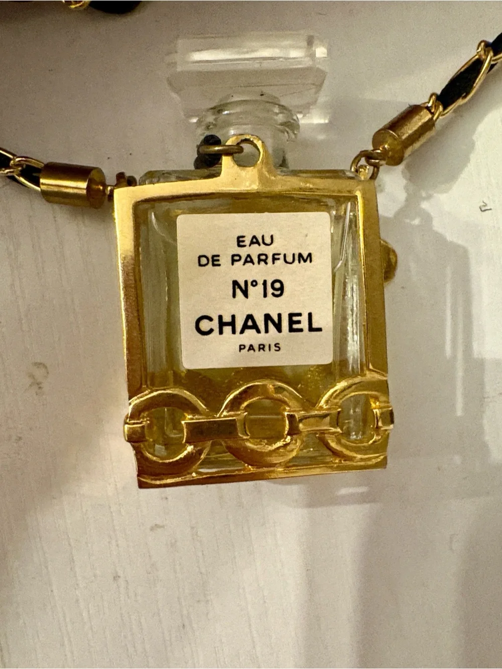 CHANEL Gold and Clear N°19 Perfume Bottle Pendant Necklace